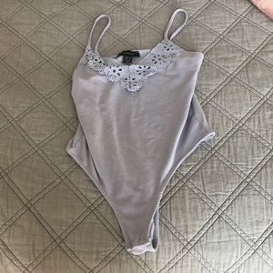 Light purple bodysuit. Worn 1x